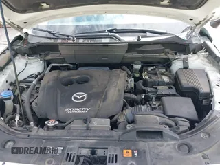 2018 Mazda CX-5 Touring with VIN JM3KFBCMXJ0353369, listed as a IAAI auction lot 41902554 with 154,104 mi miles and . Bid and sale history available at DreamBid. Image 10.