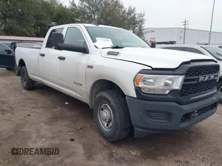 2020 Ram 2500 Tradesman with VIN 3C6UR4HJ3LG273565, listed as a IAAI auction lot 41572909 with 156,912 mi miles. Bid and sale history available at carsss.com. Image 1.