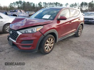2019 Hyundai Tucson SE with VIN KM8J2CA49KU881841, listed as a IAAI auction lot 41099575 with 129,153 mi miles. Bid and sale history available at carsss.com. Image 17.