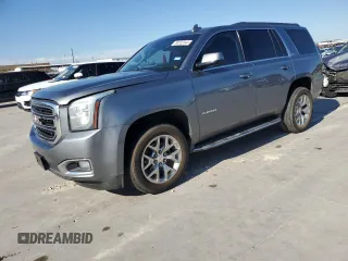 2019 GMC Yukon SLT Standard Edition with VIN 1GKS2DKC3KR134022, listed as a Copart auction lot 83202344 with 201,621 mi miles and Salvage Title. Bid and sale history available at carsss.com. Image 1.