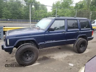 1997 Jeep Cherokee Country z VIN 1J4FJ78S4VL589852, wystawiony jako Copart lot #56294015 z przebiegiem 189 530 mil mil oraz Szkoda całkowita • Salvage title. Historia ofert i sprzedaży dostępna na DreamBid. Obrazek 1.
