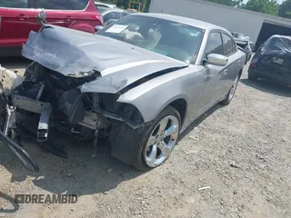 2013 Dodge Charger SE z VIN 2C3CDXBG1DH609530, wystawiony jako IAAI lot #42151140 z przebiegiem 173 210 mil mil oraz . Historia ofert i sprzedaży dostępna na DreamBid. Obrazek 17.