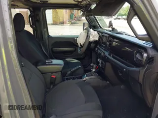 2020 Jeep Wrangler Unlimited Freedom with VIN 1C4HJXDG2LW186027, listed as a IAAI auction lot 42449664 with 87,869 mi miles and . Bid and sale history available at DreamBid. Image 5.