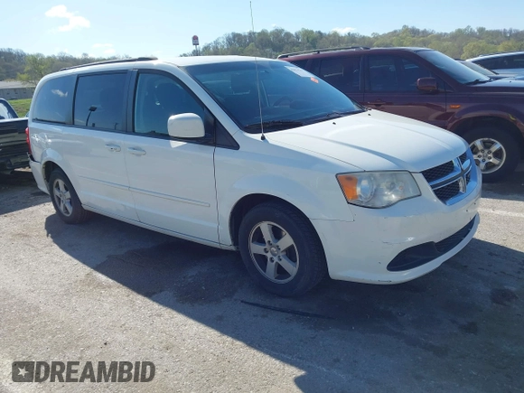 2013 Dodge Grand Caravan SXT with VIN 2C4RDGCG2DR522136, listed as a IAAI auction lot 42023561 with 176,635 mi miles and . Bid and sale history available at DreamBid. Image 1.