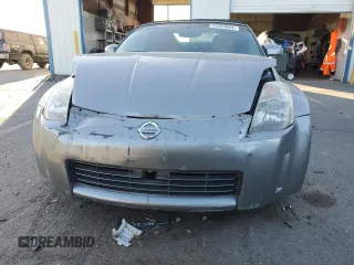 2005 Nissan 350Z Touring z VIN JN1AZ36A15M756659, wystawiony jako Copart lot #75458384 z przebiegiem 101 489 mil mil oraz Szkoda całkowita • Salvage title. Historia ofert i sprzedaży dostępna na DreamBid. Obrazek 5.