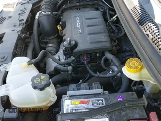 2016 Chevrolet Sonic LT z VIN 1G1JC6SB0G4155737, wystawiony jako IAAI lot #41882497 z przebiegiem 89 993 mil mil oraz . Historia ofert i sprzedaży dostępna na DreamBid. Obrazek 13.