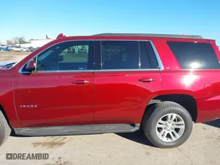 2019 Chevrolet Tahoe LT with VIN 1GNSKBKC3KR377093, listed as a IAAI auction lot 41300728 with 76,023 mi miles. Bid and sale history available at carsss.com. Image 14.