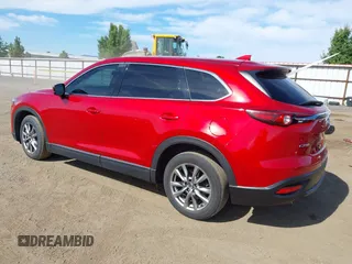 2016 Mazda CX-9 Touring z VIN JM3TCACY9G0122174, wystawiony jako IAAI lot #42613740 z przebiegiem 148 646 mil mil oraz . Historia ofert i sprzedaży dostępna na DreamBid. Obrazek 3.