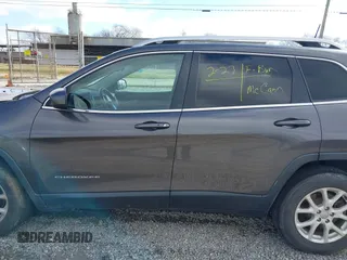 2018 Jeep Cherokee Latitude Plus with VIN 1C4PJLLXXJD606504, listed as a IAAI auction lot 41731085 with 95,569 mi miles. Bid and sale history available at carsss.com. Image 14.
