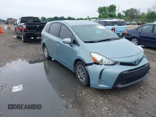 2015 Toyota Prius Two with VIN JTDZN3EU0FJ021004, listed as a IAAI auction lot 42599419 with 242,333 mi miles and . Bid and sale history available at DreamBid. Image 1.