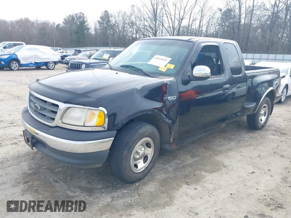 2000 Ford F-150 XL with VIN 1FTZX0725YKA09559, listed as a IAAI auction lot 41810954 with Not provided miles and . Bid and sale history available at DreamBid. Image 6.