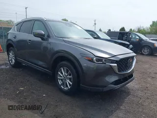 2023 Mazda CX-5 S Carbon Edition z VIN JM3KFBCMXP0225366, wystawiony jako IAAI lot #42159230 z przebiegiem 51 901 mil mil oraz . Historia ofert i sprzedaży dostępna na DreamBid. Obrazek 1.