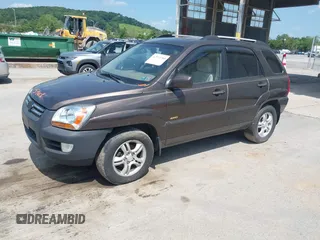 2005 Kia Sportage LX with VIN KNDJE723957075445, listed as a IAAI auction lot 42573760 with 185,000 mi miles and . Bid and sale history available at DreamBid. Image 2.