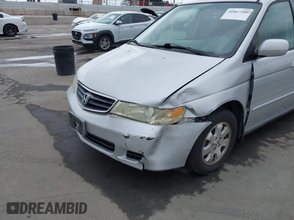 2003 Honda Odyssey EX-L with VIN 5FNRL18943B030373, listed as a IAAI auction lot 41867289 with 179,718 mi miles and . Bid and sale history available at DreamBid. Image 6.