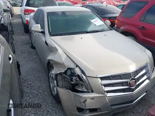 2009 Cadillac CTS AWD w/1SA with VIN 1G6DG577690146450, listed as a IAAI auction lot 38470531 with 1 mi miles. Bid and sale history available at carsss.com. Image 1.
