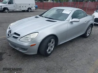 2006 Mercedes-Benz SLK-Class 3.0L with VIN WDBWK54F26F130107, listed as a IAAI auction lot 42067876 with 167,518 mi miles. Bid and sale history available at carsss.com. Image 2.