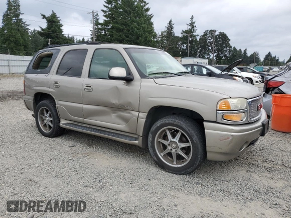 2002 GMC Yukon Denali z VIN 1GKEK63U82J224913, wystawiony jako Copart lot #60664885 z przebiegiem 208 794 mil mil oraz Szkoda całkowita • Salvage title. Historia ofert i sprzedaży dostępna na DreamBid. Obrazek 4.