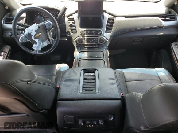 2015 Chevrolet Tahoe LTZ z VIN 1GNSKCKC8FR506151, wystawiony jako Copart lot #59948174 z przebiegiem Nie podano mil oraz Szkoda całkowita • Salvage title. Historia ofert i sprzedaży dostępna na DreamBid. Obrazek 8.