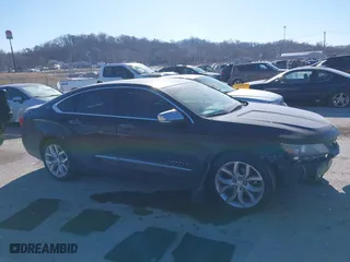 2014 Chevrolet Impala LTZ with VIN 2G1155S31E9105694, listed as a IAAI auction lot 41414595 with 128,828 mi miles. Bid and sale history available at carsss.com. Image 14.