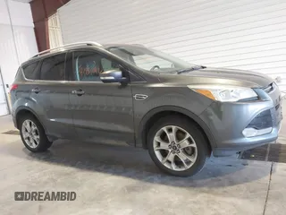 2016 Ford Escape Titanium with VIN 1FMCU9J9XGUC30596, listed as a IAAI auction lot 42024166 with 179,340 mi miles. Bid and sale history available at carsss.com. Image 13.