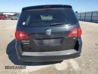 2014 Volkswagen Routan SE with VIN 2C4RVABG9ER135273, listed as a Copart auction lot 45343575 with 94,528 mi miles and Salvage title. Bid and sale history available at DreamBid. Image 6.