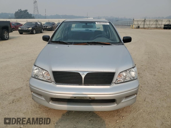 2002 Mitsubishi Lancer ES with VIN JA3AJ26E22U045919, listed as a Copart auction lot 63852225 with 184,071 mi miles and Salvage title. Bid and sale history available at DreamBid. Image 5.