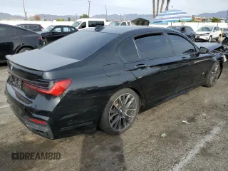 2021 BMW 7 Series 740i with VIN WBA7T2C01MCF51202, listed as a Copart auction lot 84522934 with Not provided miles and Salvage title. Bid and sale history available at DreamBid. Image 3.