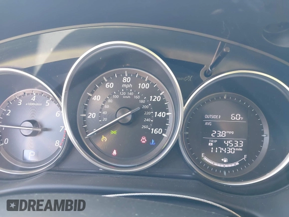 2014 Mazda CX-5 Touring с VIN JM3KE2CY7E0341630, выставлен на аукционе IAAI как лот 40830171 с пробегом 117 430 миль миль и . История ставок и продаж доступна на DreamBid. Изображение 7.