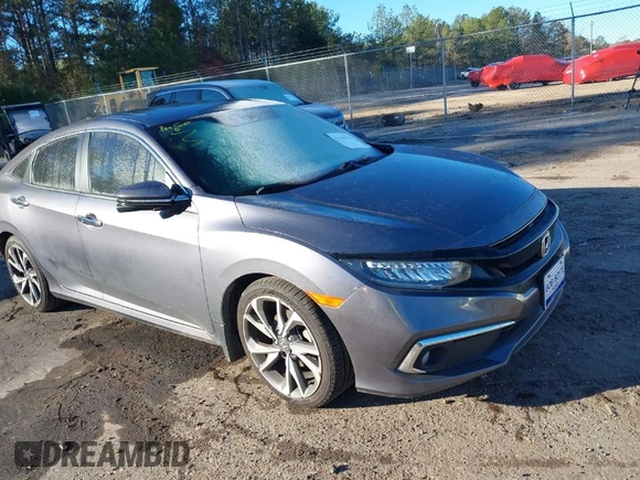 2020 Honda Civic Sedan Touring with VIN 19XFC1F97LE001901, listed as a IAAI auction lot 41048129 with 67,027 mi miles. Bid and sale history available at carsss.com. Image 1.