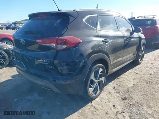 2017 Hyundai Tucson Value with VIN KM8J33A24HU343231, listed as a IAAI auction lot 41395327 with 133,017 mi miles. Bid and sale history available at carsss.com. Image 4.