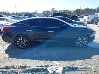 2016 Nissan Maxima SV z VIN 1N4AA6AP3GC383124, wystawiony jako IAAI lot #41821680 z przebiegiem 139 510 mil mil oraz . Historia ofert i sprzedaży dostępna na DreamBid. Obrazek 13.