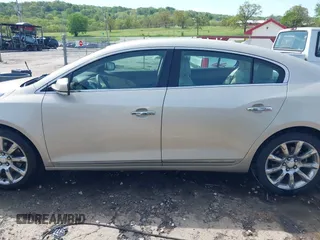 2014 Buick LaCrosse Premium I with VIN 1G4GD5G37EF197099, listed as a IAAI auction lot 42000201 with 199,212 mi miles and . Bid and sale history available at DreamBid. Image 14.