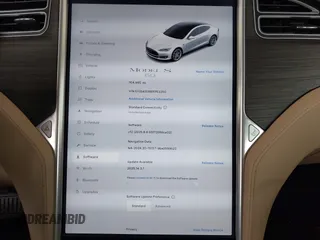 2014 Tesla Model S 60 with VIN 5YJSA1S16EFP53350, listed as a IAAI auction lot 42239753 with 104,985 mi miles and . Bid and sale history available at DreamBid. Image 7.