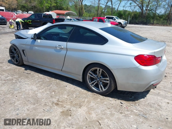 2014 BMW 4 Series 428i with VIN WBA3N7C50EK220438, listed as a IAAI auction lot 41990873 with 141,736 mi miles and . Bid and sale history available at carsss.com. Image 3.