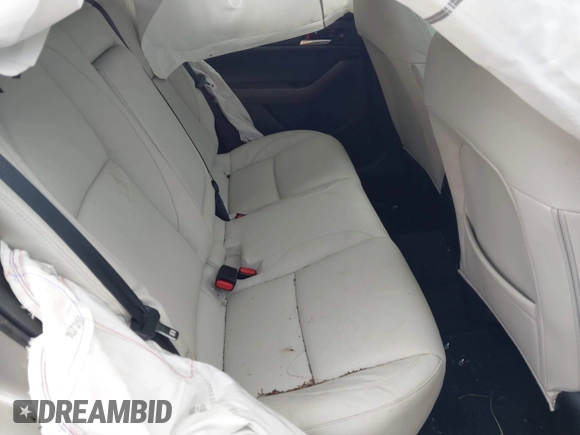 2023 Mazda CX-30 S Premium with VIN 3MVDMBDMXPM563500, listed as a IAAI auction lot 42092423 with 9,148 mi miles and . Bid and sale history available at DreamBid. Image 8.