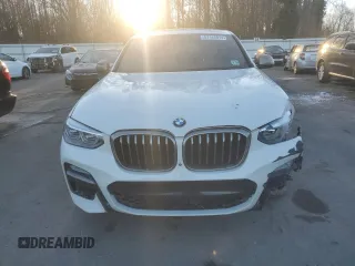 2019 BMW X4 M40i with VIN 5UXUJ5C55KLJ64105, listed as a Copart auction lot 87162014 with 92,946 mi miles and Salvage title. Bid and sale history available at DreamBid. Image 5.