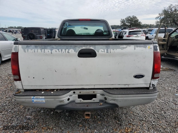 1999 Ford F-150 Work Series with VIN 1FTRF17W0XNB79739, listed as a Copart auction lot 87840925 with 0 mi miles and Salvage Title. Bid and sale history available at carsss.com. Image 6.