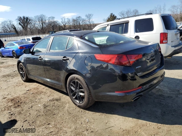 2011 Kia Optima LX with VIN KNAGM4A74B5068763, listed as a Copart auction lot 89064315 with 219,733 mi miles and Salvage Title. Bid and sale history available at carsss.com. Image 2.