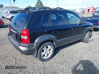 2006 Hyundai Tucson GLS with VIN KM8JN12DX6U415822, listed as a IAAI auction lot 41820694 with 167,543 mi miles. Bid and sale history available at carsss.com. Image 4.