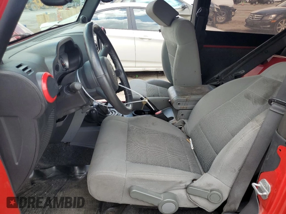 2009 Jeep Wrangler Rubicon with VIN 1J4GA64129L708452, listed as a Copart auction lot 62280484 with 103,714 mi miles and Clean Title. Bid and sale history available at DreamBid. Image 7.