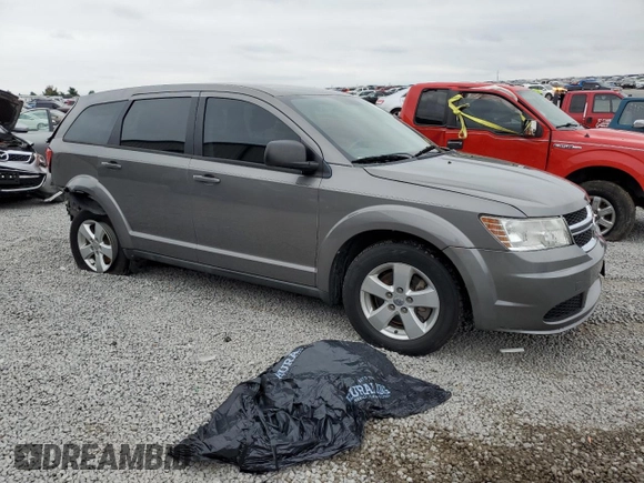 2013 Dodge Journey American Value with VIN 3C4PDCAB7DT500878, listed as a Copart auction lot 58397655 with 183,755 mi miles and Salvage title. Bid and sale history available at DreamBid. Image 4.