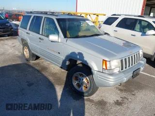 1997 Jeep Grand Cherokee Limited with VIN 1J4GZ78Y8VC718435, listed as a IAAI auction lot 41405361 with 210,599 mi miles. Bid and sale history available at carsss.com. Image 1.