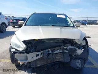 2017 Ford Focus SE with VIN 1FADP3K20HL215777, listed as a IAAI auction lot 41597028 with 137,248 mi miles. Bid and sale history available at carsss.com. Image 13.