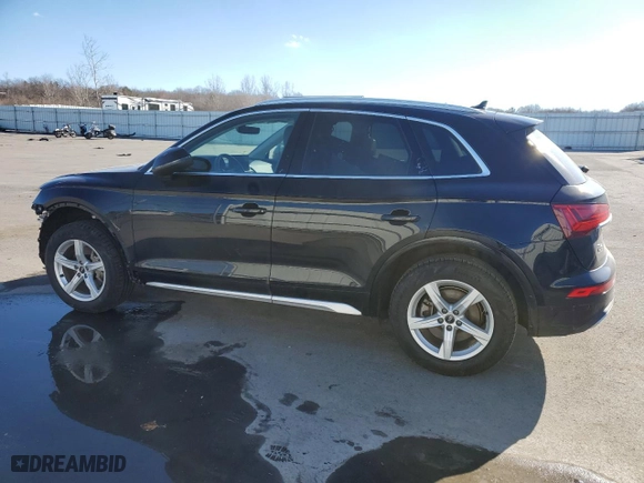 2021 Audi Q5 Premium with VIN WA1AAAFY9M2111834, listed as a Copart auction lot 46977295 with 56,388 mi miles and Salvage Title. Bid and sale history available at carsss.com. Image 2.