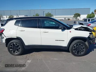 2020 Jeep Compass Trailhawk with VIN 3C4NJDDB4LT144129, listed as a IAAI auction lot 42582688 with 67,112 mi miles and . Bid and sale history available at DreamBid. Image 14.