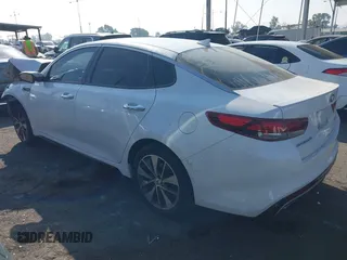 2016 Kia Optima SX Turbo with VIN 5XXGW4L2XGG043934, listed as a IAAI auction lot 40451940 with 86,386 mi miles and . Bid and sale history available at carsss.com. Image 3.