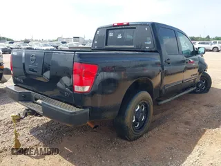 2012 Nissan Titan SV with VIN 1N6AA0EK2CN306066, listed as a IAAI auction lot 42106379 with 135,556 mi miles and . Bid and sale history available at DreamBid. Image 4.