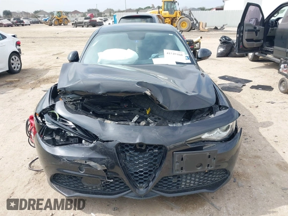 2017 Alfa Romeo Giulia Ti z VIN ZARFAECN7H7541762, wystawiony jako IAAI lot #41549460 z przebiegiem Nie podano mil oraz . Historia ofert i sprzedaży dostępna na DreamBid. Obrazek 12.