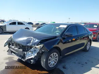 2013 Toyota Camry L with VIN 4T4BF1FK1DR308848, listed as a IAAI auction lot 42014028 with 192,645 mi miles. Bid and sale history available at carsss.com. Image 2.
