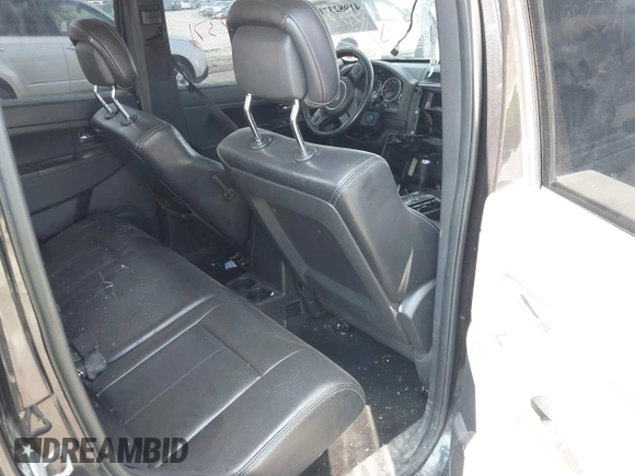 2012 Jeep Liberty Sport with VIN 1C4PJMAK8CW182731, listed as a IAAI auction lot 41982371 with 216,863 mi miles. Bid and sale history available at carsss.com. Image 8.